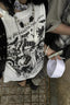 Edgy Printed Textured Knit T-shirt