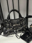 Studded Perforated Moto Shoulder Bag