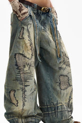 Trendy Hole Patched Denim Pants