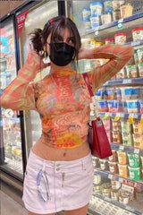 Trendy Sheer Mesh Long Sleeve Graphic Mesh Top