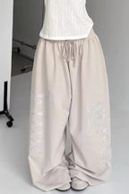 Ornate Script Drawstring Wide Pants