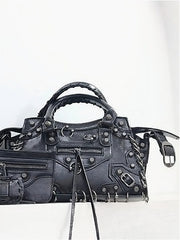 Perforated Studded Moto Crossbody Bag